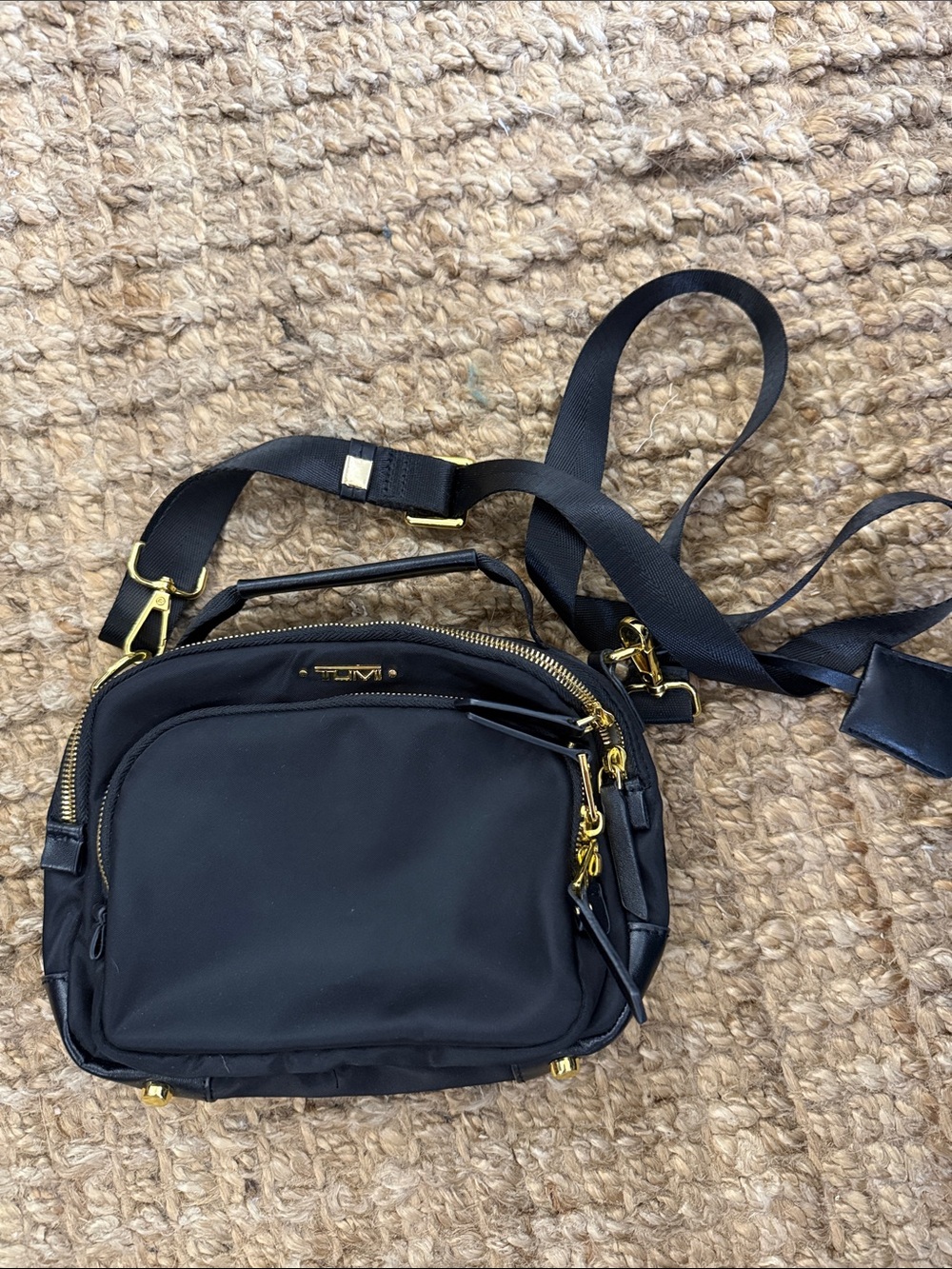 Tumi Black Crossbody Bag with Gold Hardware